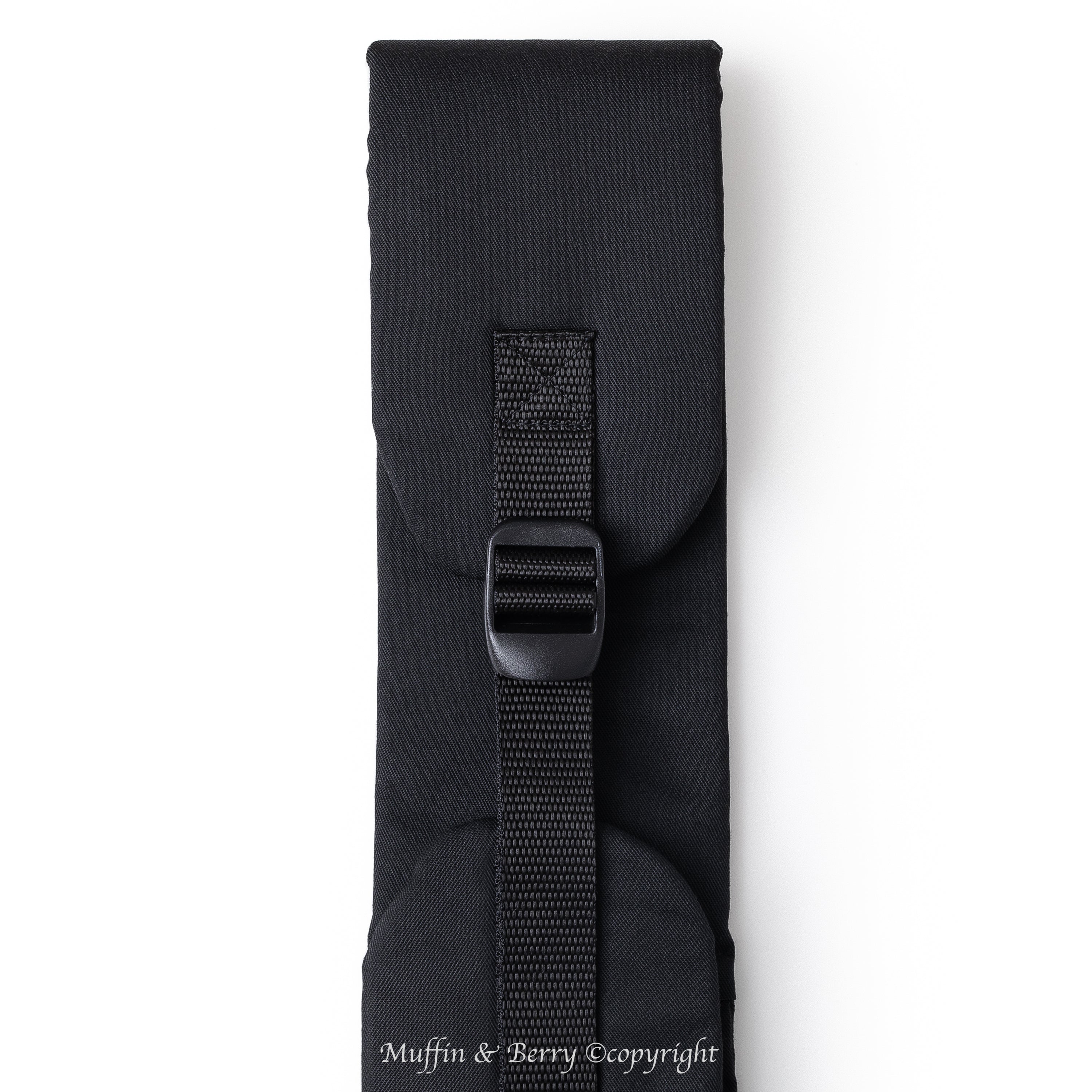 Muffin & Berry pet sling carrier padded adjustable shoulder strap with slide buckle close-up – black trench fabric dog and cat sling bag for comfortable hands-free carrying