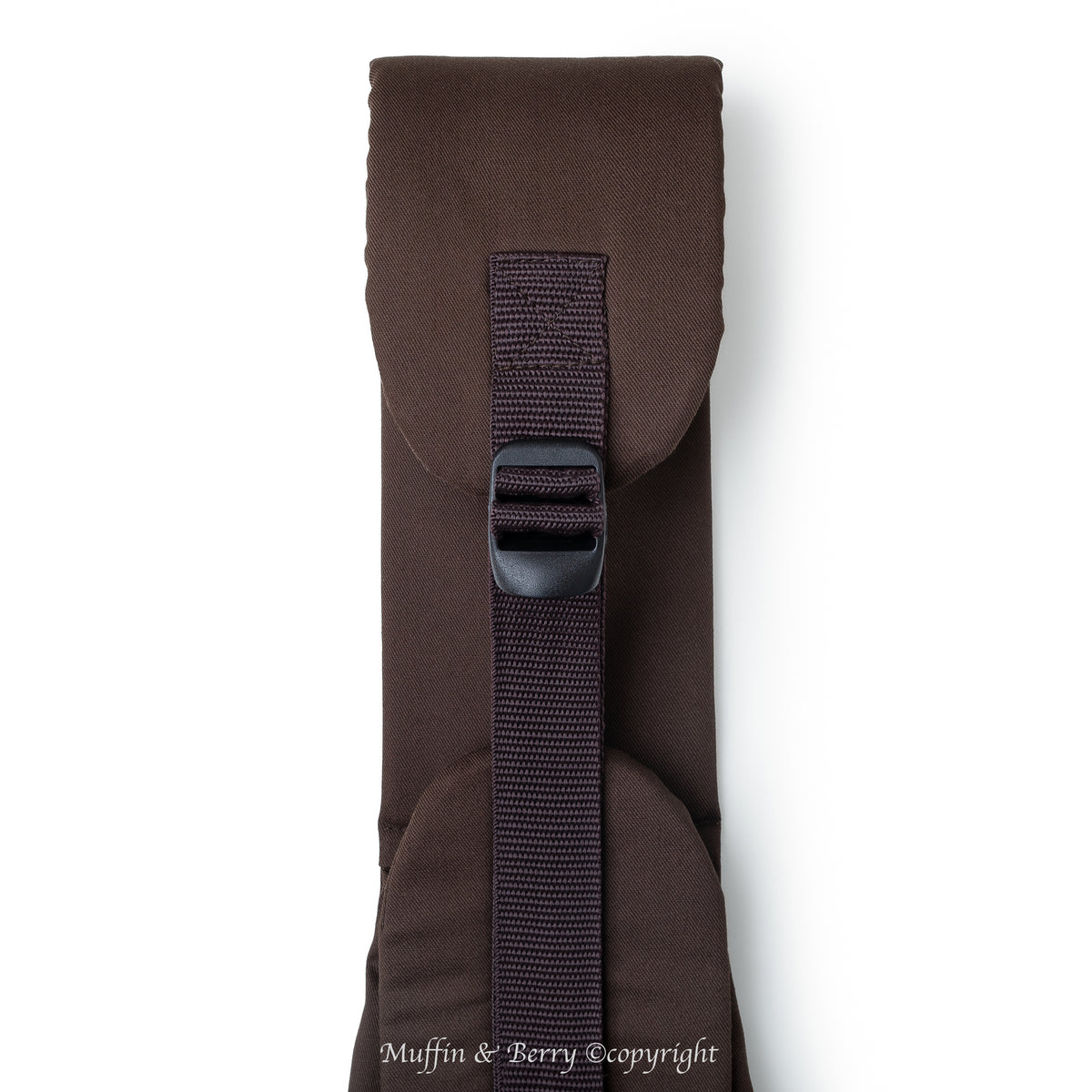 Close-up of BONNIE brown pet sling carrier padded shoulder strap with slide buckle, adjustable dark brown nylon webbing, by Muffin & Berry