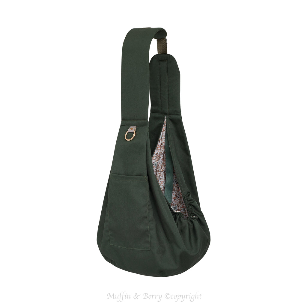 Muffin & Berry dark green trench pet sling bag Anita full view with floral interior lining, front pocket and gold O-ring – premium dog and cat sling carrier