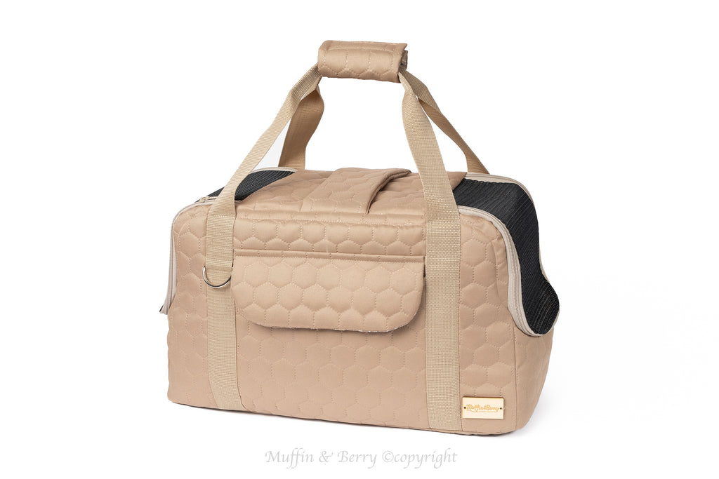 Muffin & Berry Mila pet travel carrier in beige quilted fabric with short carry handles and front storage pocket – luxury dog and cat carrier bag