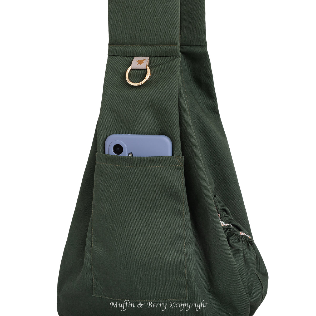 Muffin & Berry pet sling carrier Anita close-up of front phone pocket and gold O-ring – forest green color dog sling bag with storage pocket