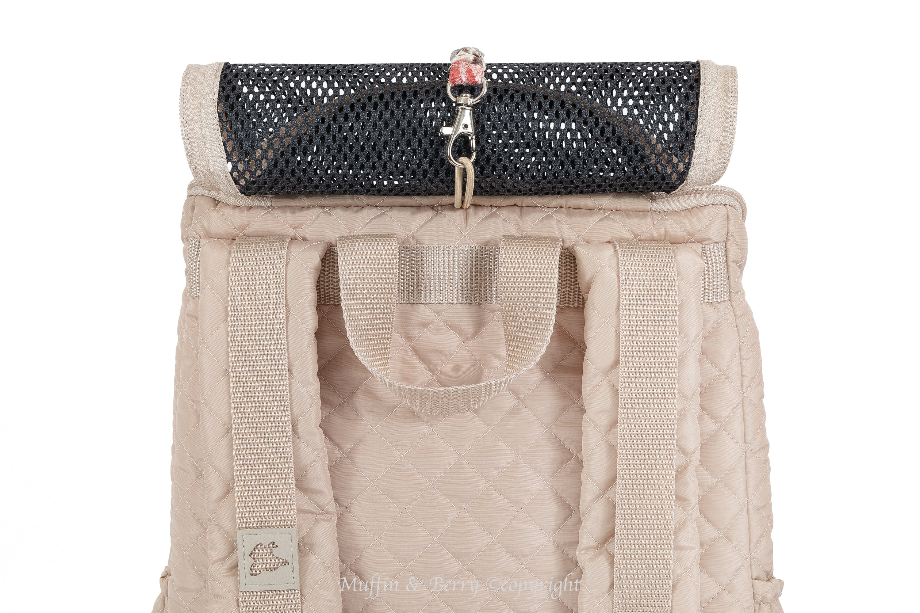 Beige quilted front pet carrier with top mesh window rolled up and snapped open, shoulder straps visible – by Muffin & Berry