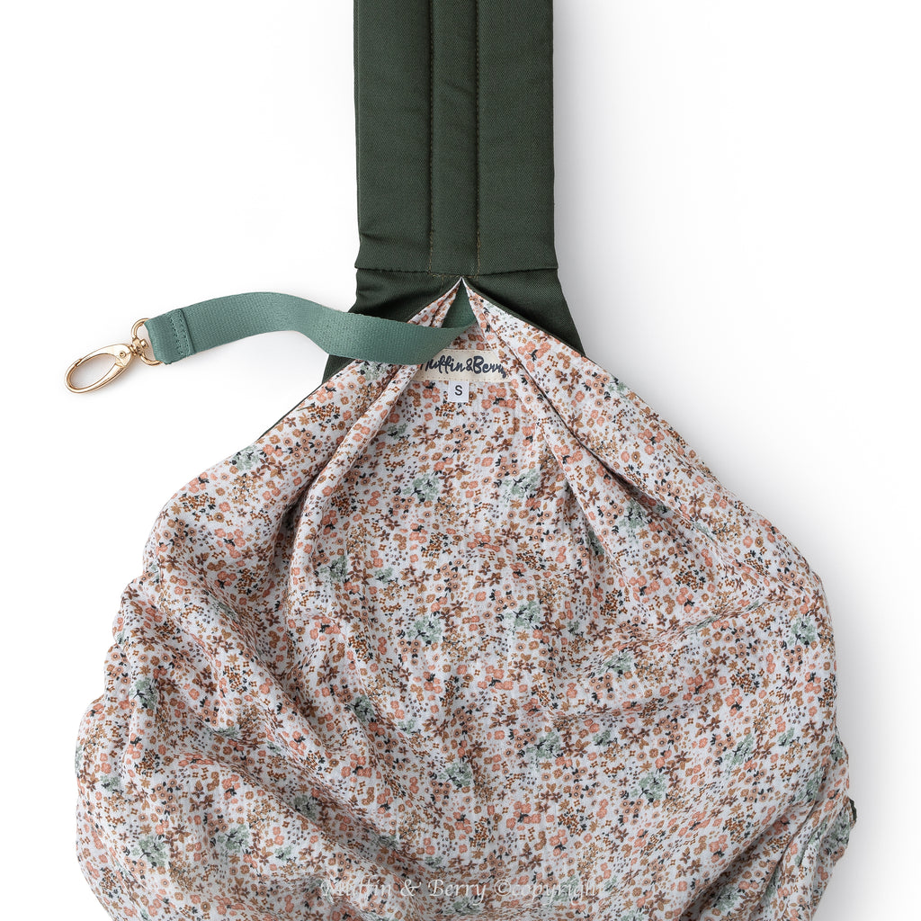 Pet sling carrier from Muffin & Berry interior – floral cotton lining with gold safety leash clip for secure dog and cat carrying