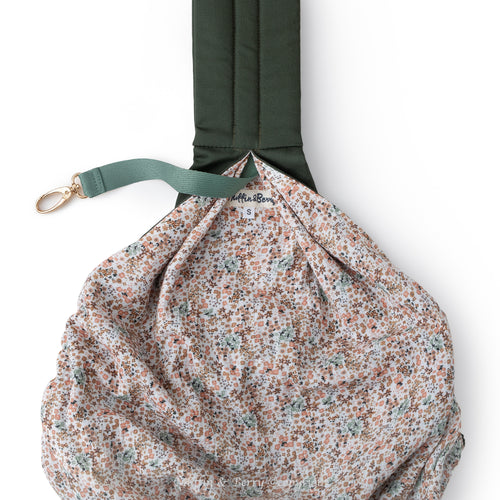 Pet sling carrier from Muffin & Berry interior – floral cotton lining with gold safety leash clip for secure dog and cat carrying
