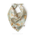 A sage green dog and cat bandana SKYLER featuring a white and gold floral print, tied in a triangular knot on a clean white background, by Muffin & Berry