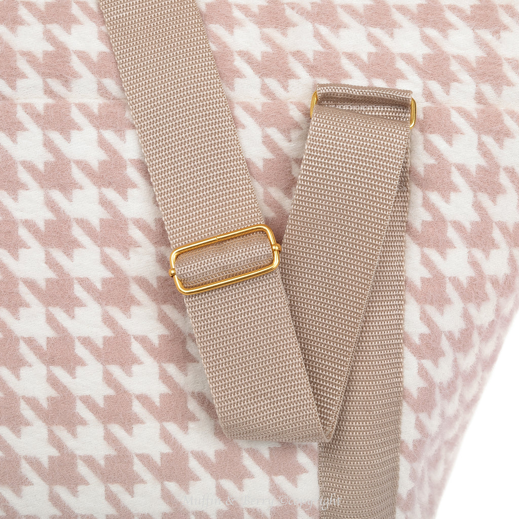 Close-up of adjustable rose pink nylon shoulder straps with gold-tone hardware on DAPHNE houndstooth tweed dog carrier bag, by Muffin & Berry