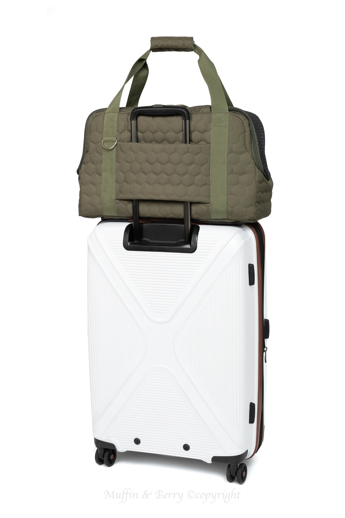 Muffin & Berry Elizabeth olive green pet travel carrier attached to suitcase handle via luggage sleeve – hands-free travel solution for pet owners