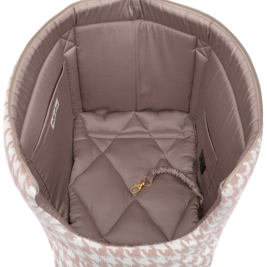 Top view of DAPHNE dog carrier bag interior showing dusty rose cotton satin lining, quilted cushion and gold safety leash clip, by Muffin & Berry